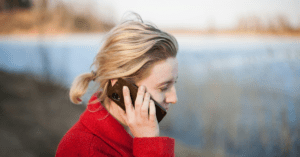 Blonde woman talking on a cell phone