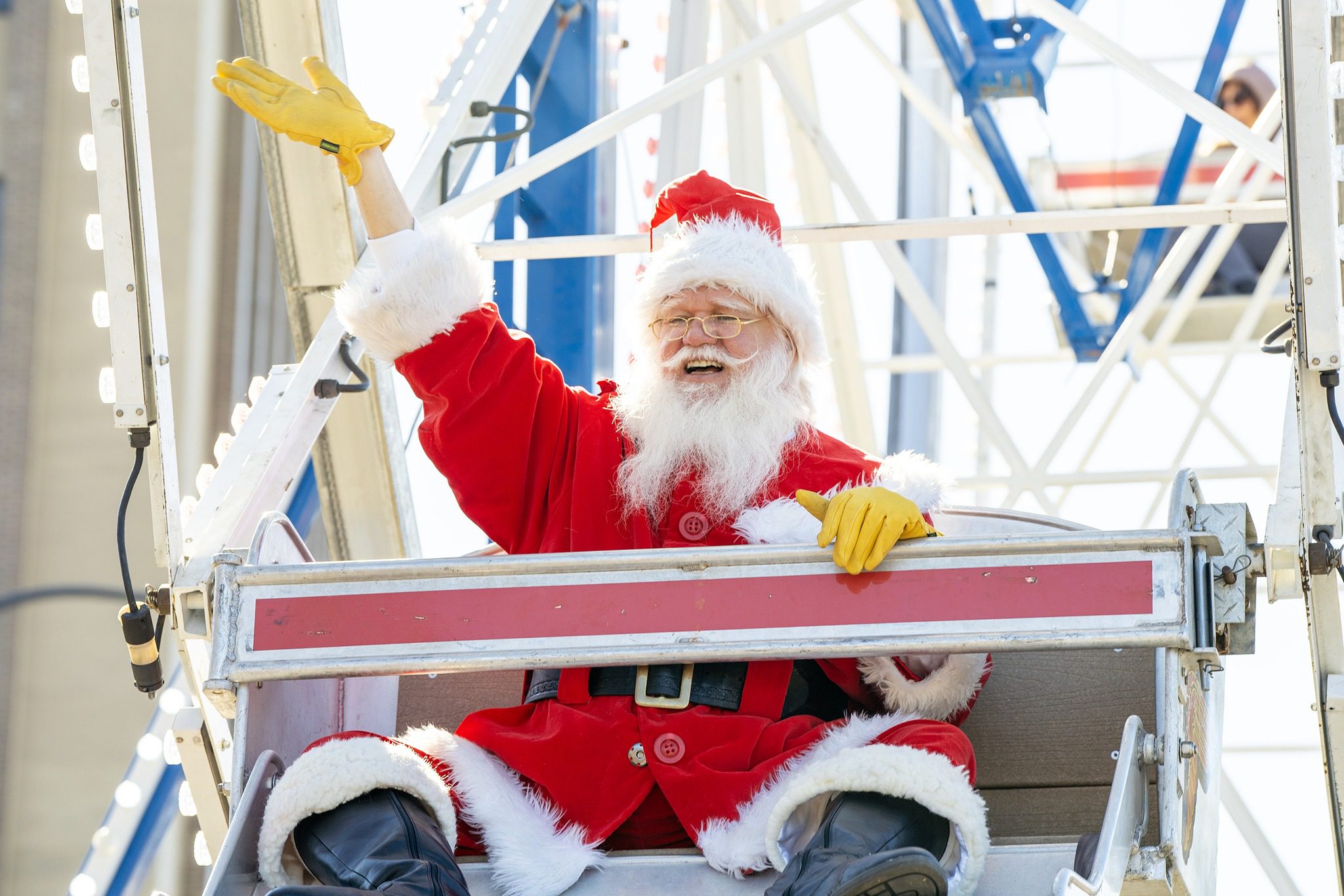 Image of Santa Clause waving from a ferris wheel
