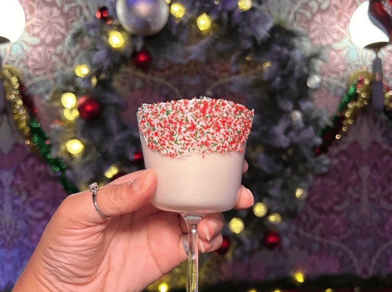Kidnap Sandy Claws cocktail with holiday sprinkles on the rim