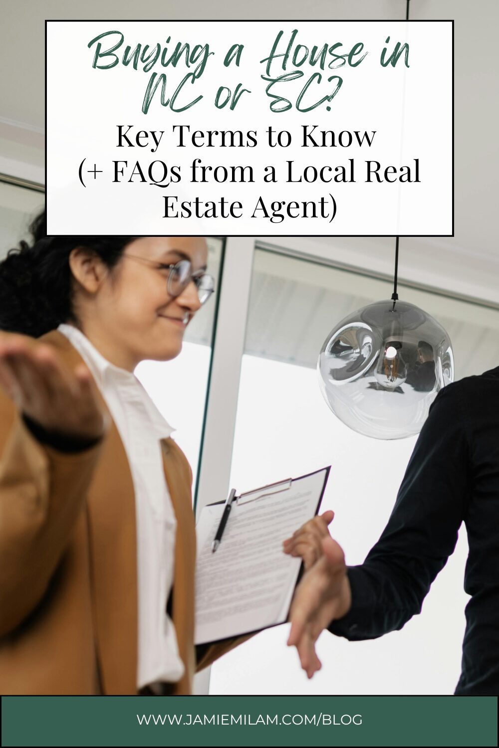 A real estate agent with a clipboard showing a client their new home, with the text "Buying a House in NC or SC? Key Terms to Know (+ FAQs from a Local Real Estate Agent)"