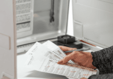 woman completing election ballot