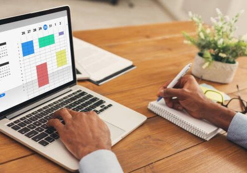 istockphoto-1227505959-612x612 Time management concept. Collage with African American businessman using online planner to organize work agenda. Panorama