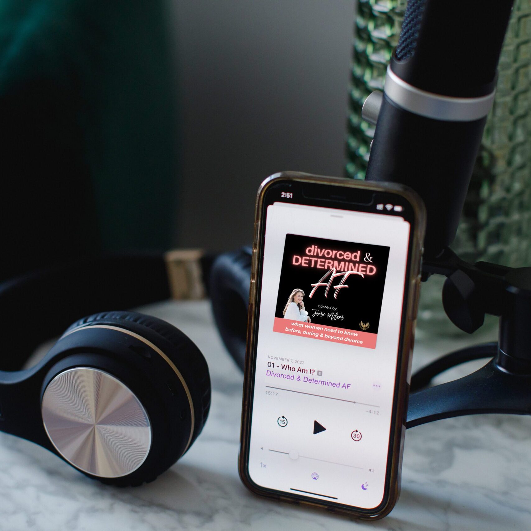 podcast microphone and headphones divorced and determined af